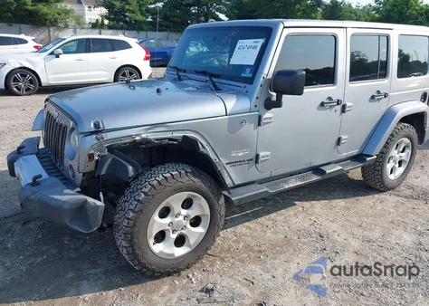 2015 Jeep Wrangler Unlimited Sahara from USA, damaged, VIN 1C4BJWEG9FL570780